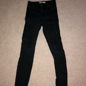 Black jeans with rips